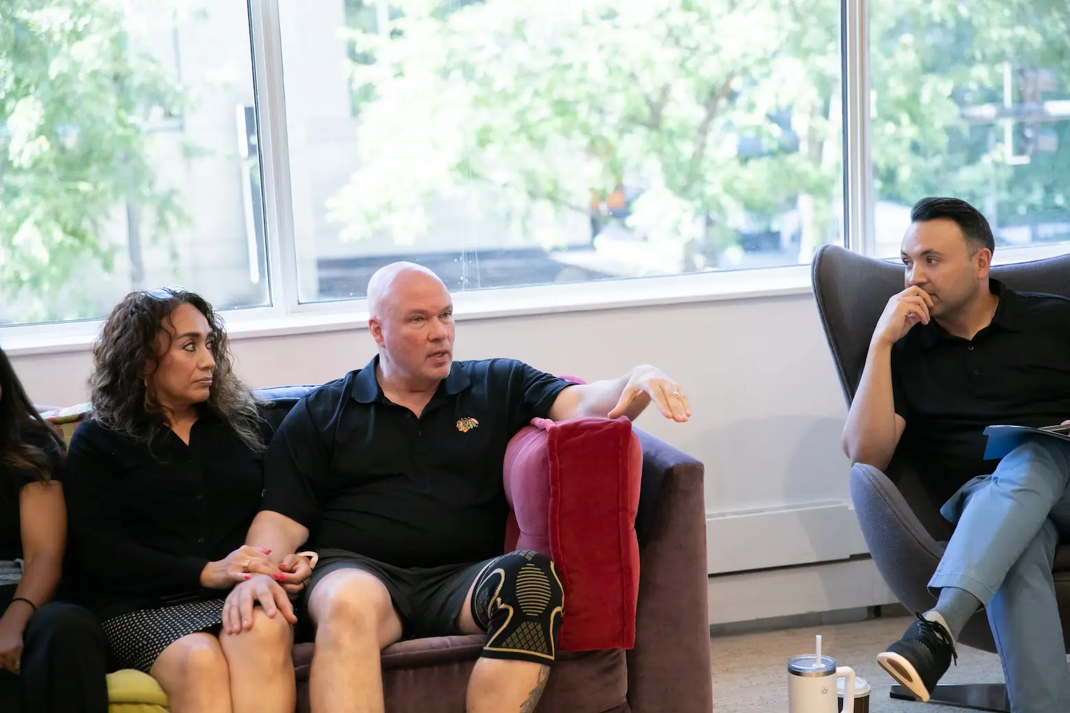 Mentor and fellow discussing goals in a professional setting